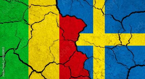 Flags of Mali and Sweden on cracked surface - politics, relationship concept