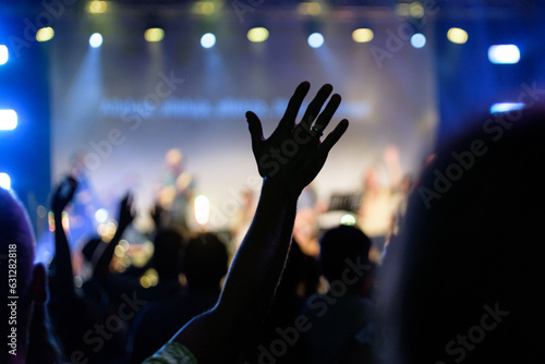 Christians raising their hands in praise and worship.