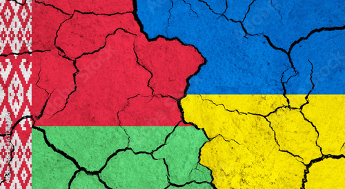 Konstfotografi Flags of Belarus and Ukraine on cracked surface - politics, relationship concept