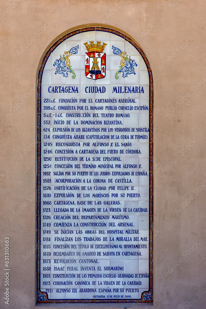 Fototapeta premium Azulejos en la Pared que indican las principales fechas de la milenaria ciudad de Cartagena, España.