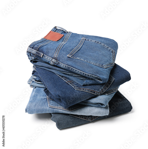 Stack of different folded jeans isolated on white