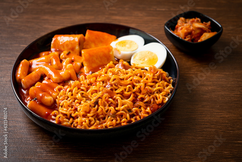 Korean instant noodles with Korean rice cake and fish cake and boiled egg photo