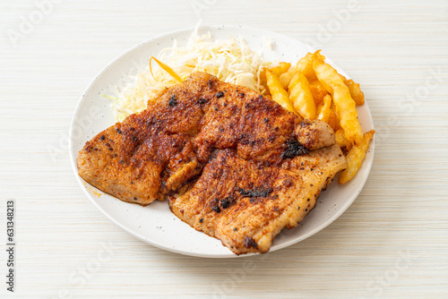 grilled spicy barbecue pork steak with french fries