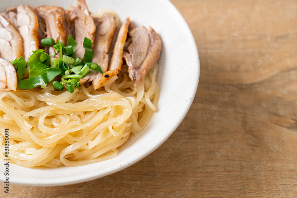 dried duck noodles in white bowl dried duck noodles in white bowl