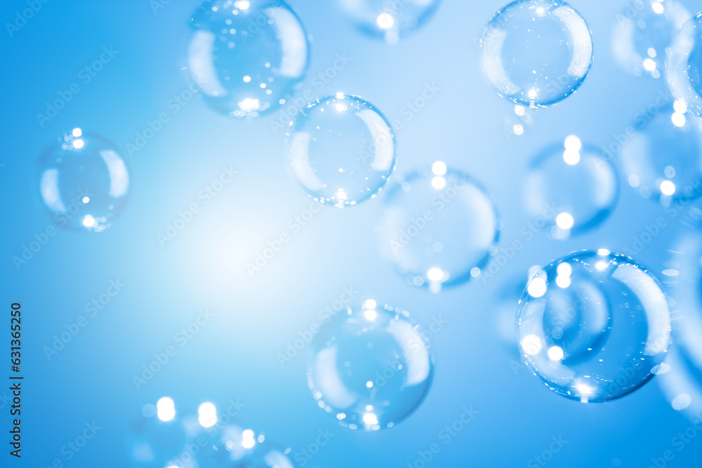 Beautiful Transparent Shiny Blue Soap Bubbles Floating in The Air. Abstract Background, Blue Textured, Celebration Festive Backdrop, Refreshing of Soap Suds, Bubbles Water.