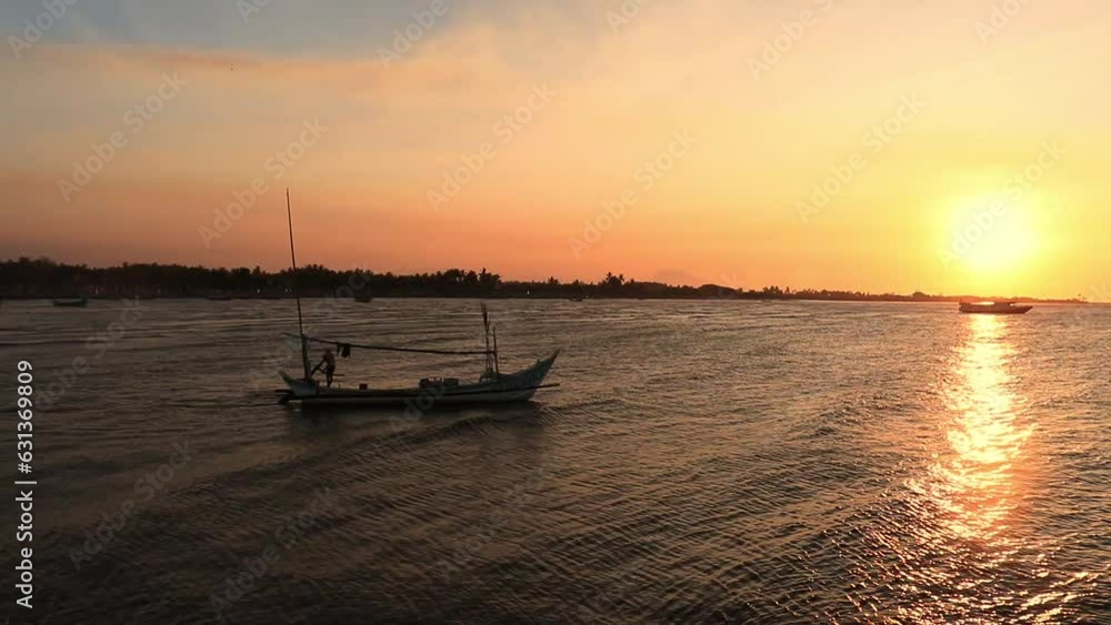 fishermen go fishing in the evening on the beach, fishing with the beauty of the beach sunset, jawa timur, indonesia fishermen go fishing in the evening on the beach, fishing with the beauty of the beach sunset, jawa timur, indonesia