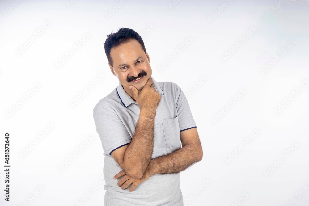 Indian man giving happy expression on white background. Indian man giving happy expression on white background.