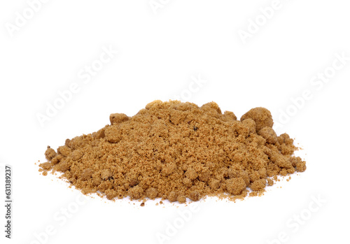 Brown unrefined cane sugar isolated on white background