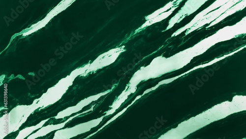 natural texture of dark green marble with white veins pattern. Italian white and dark green panda marble stone design. interior emerald colored stone material for design.