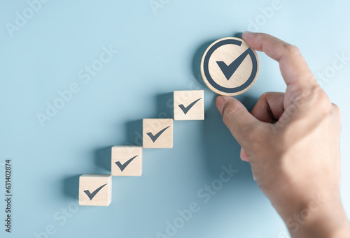 Fotografía Step progress checklist to Quality Standard approved Assurance assignment and improvement