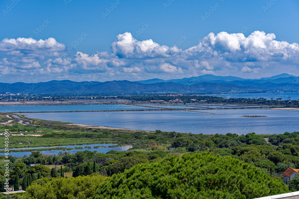 Scenic view of Giens peninsula on a sunny spring day with Mediterranean Sea, beach and saline in the background. Photo taken June 8th, 2023, Giens, Hyères, France.