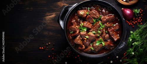 A picture of Meat Stew, with beef stewed in red wine sauce, viewed from the top with copy space.