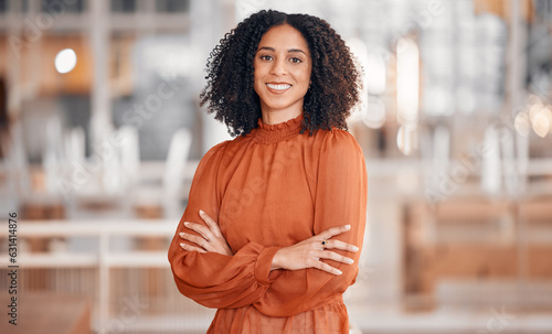 Smile, arms crossed and portrait of a woman at work for business pride and corporate confidence. Happy, office and a young employee with career empowerment and job motivation in the workplace photo