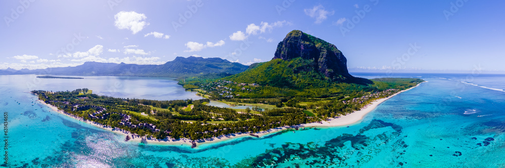 droen aerial vie at Le Morne beach Mauritius Tropical beach with palm trees and white sand blue ocean