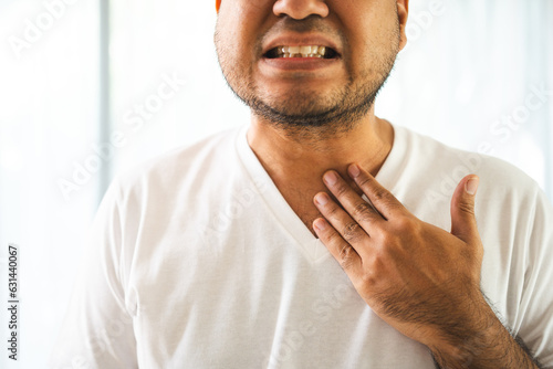 Man have throat irritation, mucus and coughing. Fever headache respiratory tract infection. Male unhealthy Sickness need to consult a doctor and get treatment. On isolated white background.