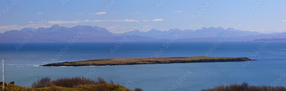 Panoramic image of Staffin Island on the Isle of Skye with the Torridon Mountains in the distance, Skye, Scotland, UK.