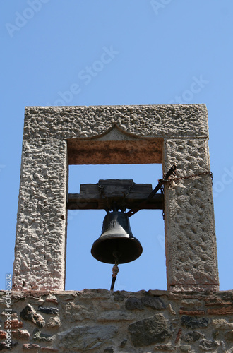 Bell of The St George Church of The Boys School with Blue Sky Background in Kos, Greece