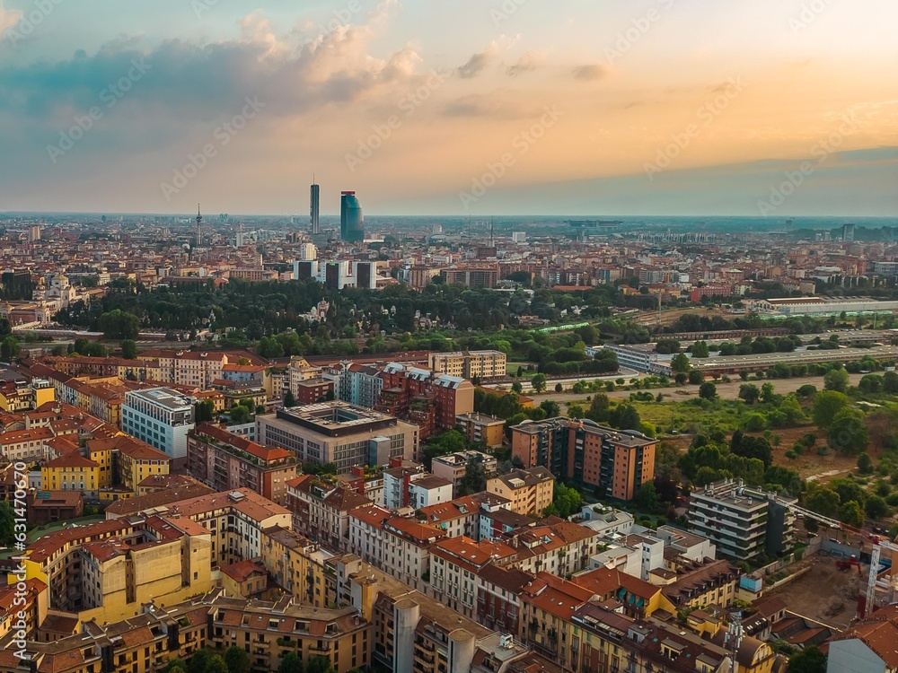 Cityscape sunset Milan Italy aerial view