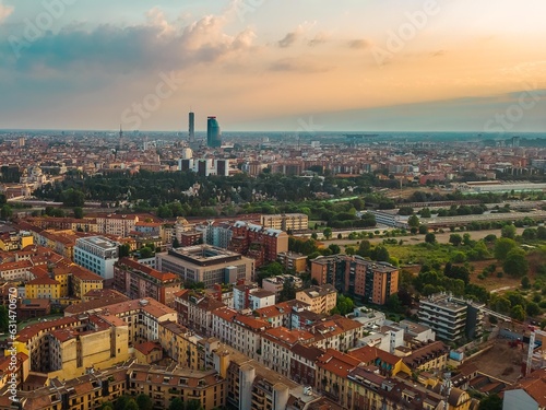 Cityscape sunset Milan Italy aerial view