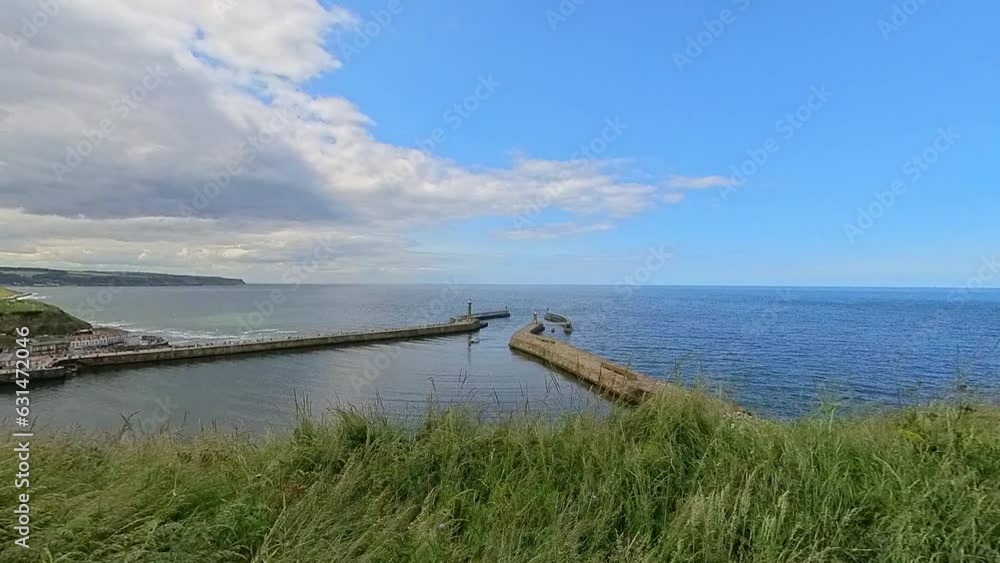 View over two piers and harbour entrance View over two piers and harbour entrance