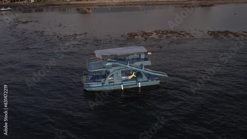 Sunset Low-Flight over Ocean and Grounded Boat Snorkeling Station - Drone Footage of Scenic Seascape at Low Tide