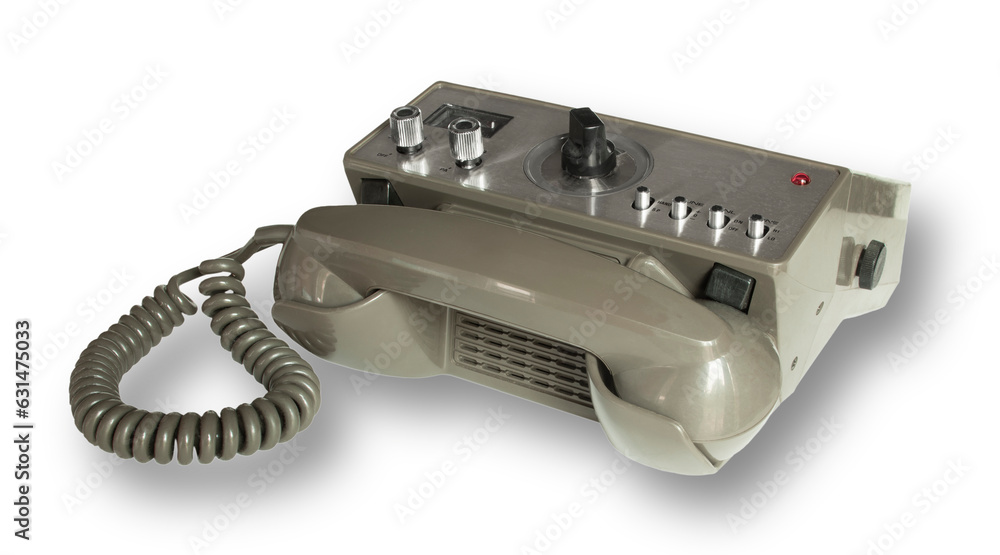 Telephone handset wish shadow under a two way radio Telephone handset wish shadow under a two way radio