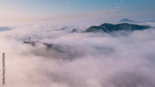 Wallpaper Mural 4K motion time lapse video aerial view morning scenery Mist flowing over the high mountains The movement of fog and clouds, Pang Puey, Mae Moh, Lampang, Thailand	 Torontodigital.ca