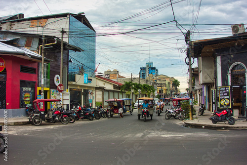 Iquitos Peru, street in the city with mototaxi