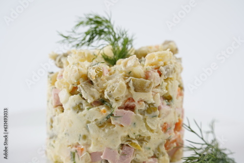 Salad mayonnaise. Potato salad with mayonnaise. Traditional salad with cooked vegetables, meat or sausage and mayonnaise.
