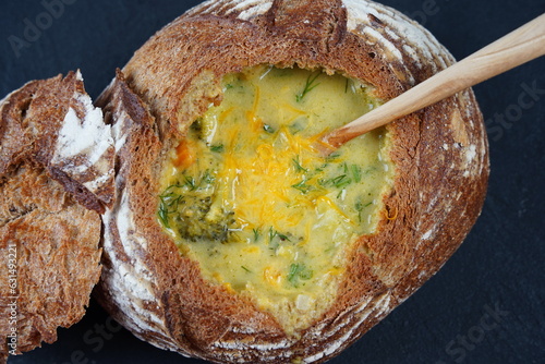 Homemade Broccoli and Cheddar Soup in a Bread Bowl. Czech cuisine