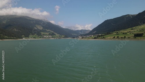 Wallpaper Mural Lake Reschensee in Tirol with the sunken church tower Torontodigital.ca