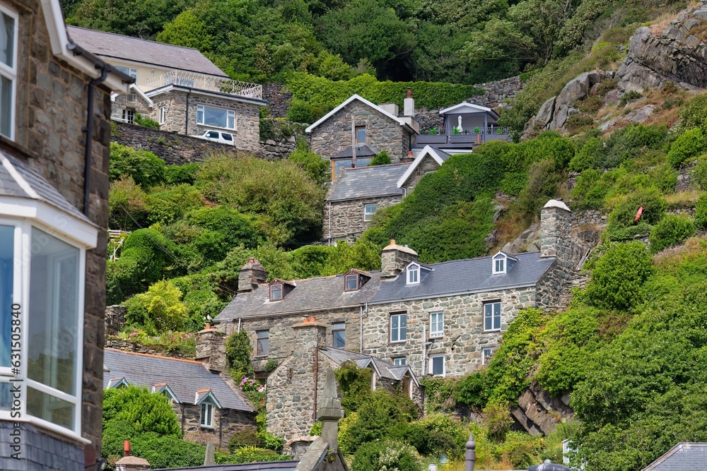 view of the houses climbing the green mountain in Barmouth, UK