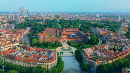 Aerial view of autumn trees in the sempione park near the Castello Sforzesco castle. roofs. View of the medieval castle at sunset. Ecology. Milan. Italy, 11.10.2023 photo