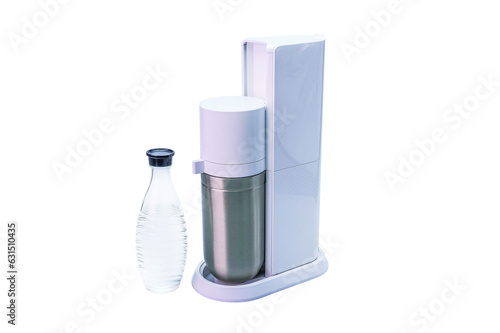 Close up view of soda stream machine and glass bottle with water. Sweden. photo