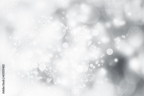 gray and white blur abstract background. bokeh christmas blurred beautiful shiny Christmas lights.