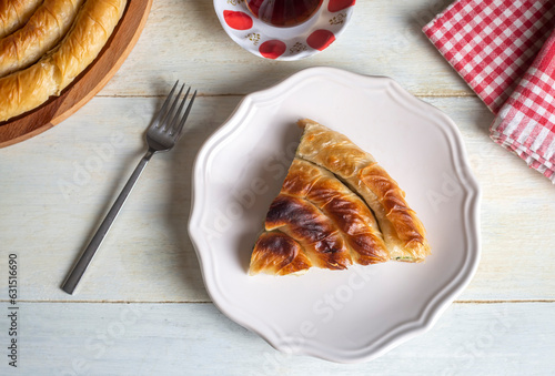 Turkish Tepsi Boregi, Round Borek, Tray pastry (Turkish name; rulo borek - ispanakli borek) photo