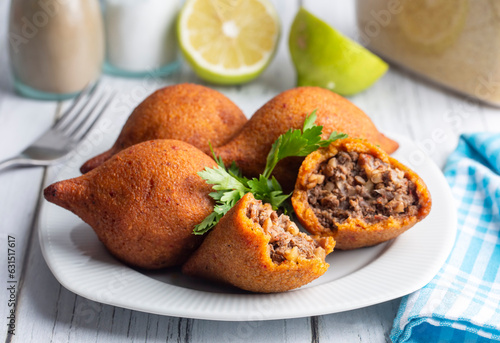 Kibbeh is a popular dish in Middle Eastern cuisine (Turkish name; icli kofte) photo