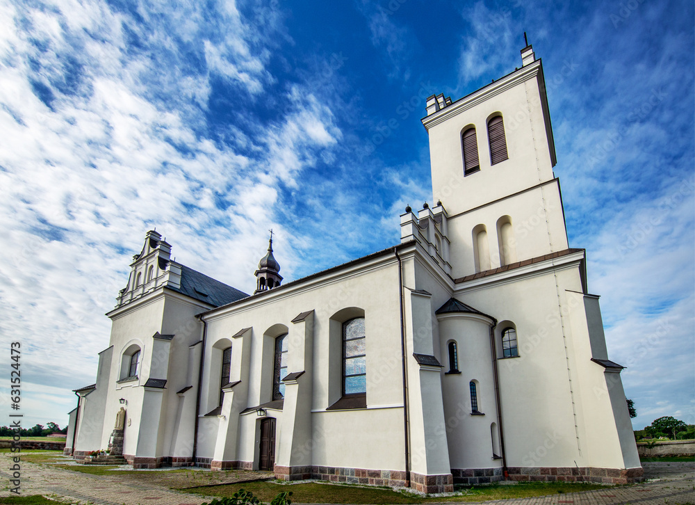 General view and close-up of architectural details of the St. Stanislaus Catholic Church built in 1905 in Sieluń, Masovia, Poland. General view and close-up of architectural details of the St. Stanislaus Catholic Church built in 1905 in Sieluń, Masovia, Poland.