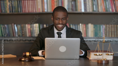 African Male Lawyer Working on Laptop
