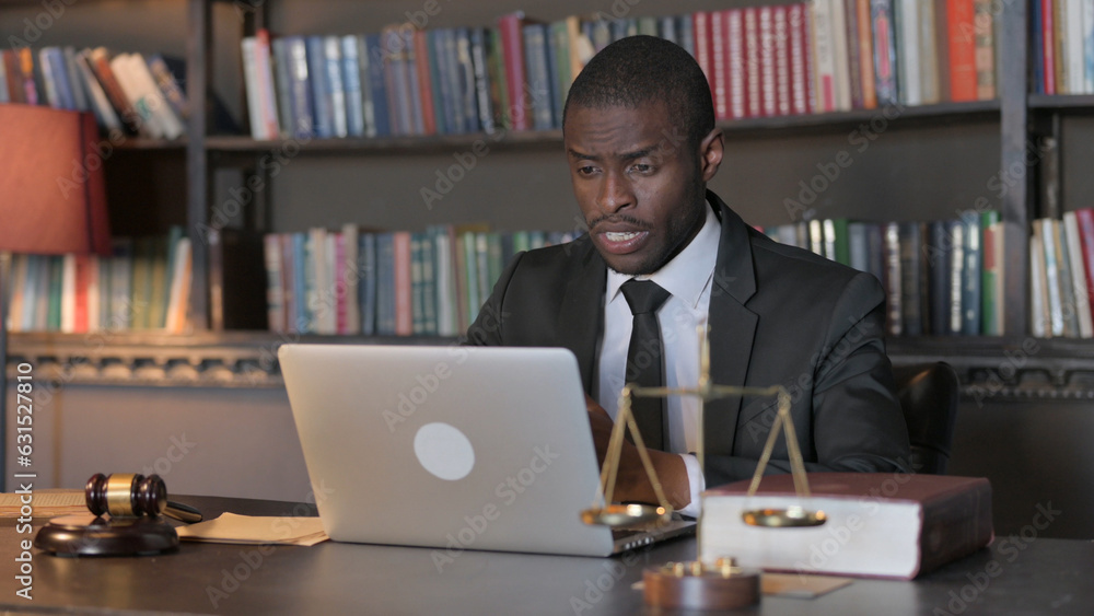 Online Video Chat by African American Lawyer on Laptop