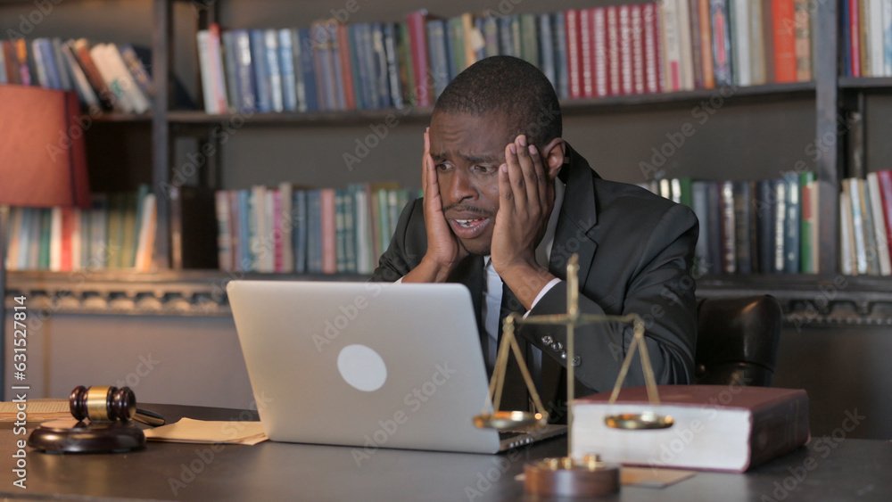 African American Lawyer Shocked by Loss on Laptop African American Lawyer Shocked by Loss on Laptop