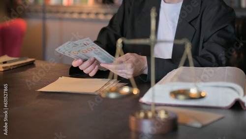 Close up of Female Lawyer Counting Money