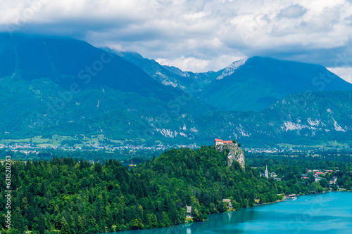 A view from the Ojstrica viewpoint towards the castle above Lake Bled, Slovenia in summertime © Nicola