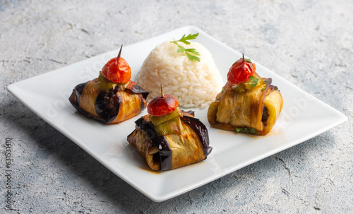 Traditional delicious Turkish food; Kofte kebab wrapped in eggplant (Turkish name; Islim - islim kebabi or kurdan kebabi) photo