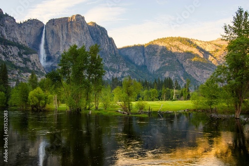Fototapeta Naklejka Na Ścianę i Meble -  Springtime Splendor: Captivating 4K View of Yosemite Falls from Merced River, California, USA