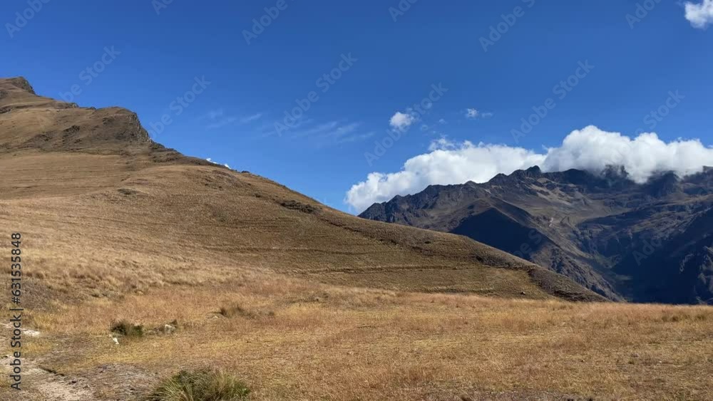 Beautiful big mountains with rocky peaks under the sunny blue sky Beautiful big mountains with rocky peaks under the sunny blue sky