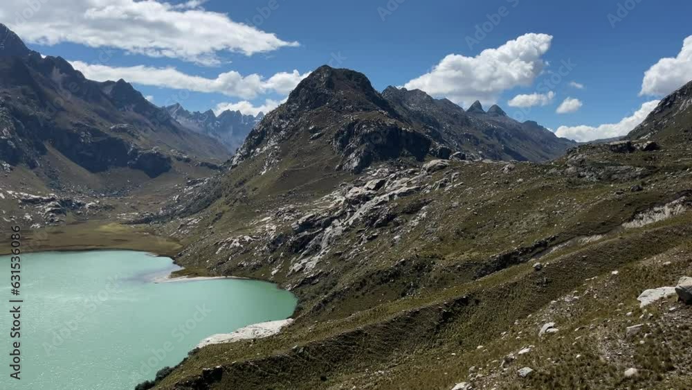 Aerial view of the beautiful Lake Querococha and nearby mountains in Huascaran National Park Aerial view of the beautiful Lake Querococha and nearby mountains in Huascaran National Park