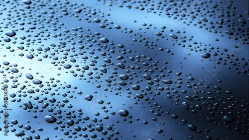 Beads of water gather on a painted metalic surface