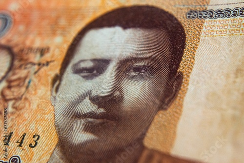Closeup of the Norodom Sihanouk, king of Cambodia, as depicted on 100 Riels banknote photo