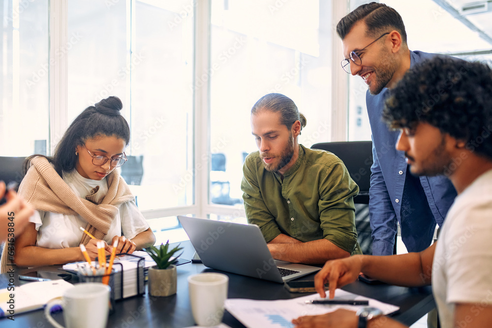 A group of young freelancers working in a coworking space